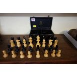 A boxwood and ebonized Staunton pattern chess set, king 8.3cm, pawn 4cm, in box.