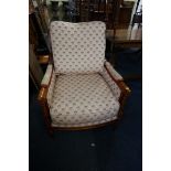 A good beechwood and upholstered occasional armchair, by Wesley Barrel.