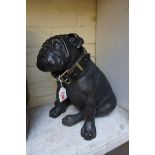 A bronze Pug, labelled 'Brights of Nettlebed', 29cm high.
