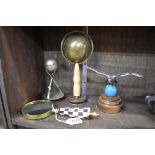 A mixed lot, to include a novelty inkwell; a magnifying glass; and a chrome eagle, possibly a car