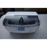 A digital ultrasonic cleaner.