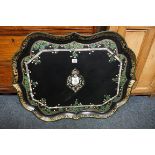 A large 19th century papier mache tray, of shaped outline, with mother of pearl decoration, 81.5cm
