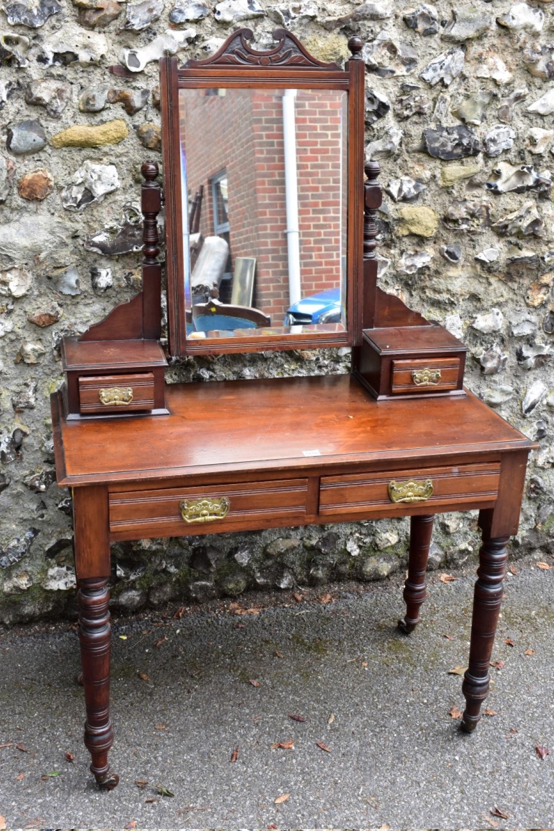 A circa 1900 mahogany mirror back dressing table, 91cm wide x 45cm deep x 145cm high.