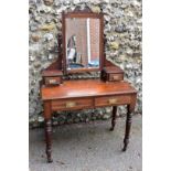 A circa 1900 mahogany mirror back dressing table, 91cm wide x 45cm deep x 145cm high.