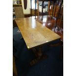 A small oak trestle table, with cleated end top, 152cm long.