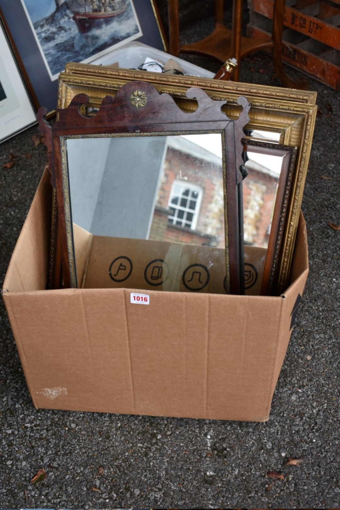 Two gilt wall mirrors; together with a fretwork mirror and one other.