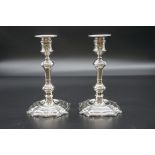 A pair of electroplated candlesticks, 19.5cm high.
