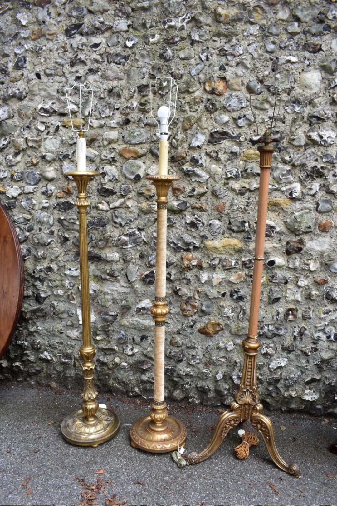 Three various gilt standard lamps.