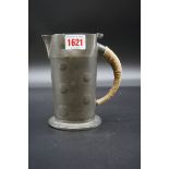 A Liberty Tudric pewter jug, by Archibald Knox, No.0279, 15cm high, (lacking hinged cover).