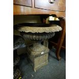 A Victorian cast iron campana urn on pedestal, 56cm high x 54cm diameter.