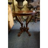 A reproduction mahogany circular occasional table, 59.5cm diameter.