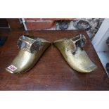 A pair of antique brass stirrups, possibly Spanish Conquistador.