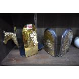 Two pairs of brass bookends.