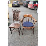 A circa 1880 carved oak chair; together with a desk type chair and an old trumpet work table.