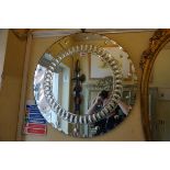 An Art Deco circular wall mirror, with convex detail, 60cm diameter.