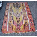 A Tribal rug, having geometric design, 150 x 108cm.