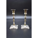 A pair of Georgian style silver candlesticks, by Walker & Hall, Sheffield 1928, 17cm, (weighted). (