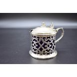 A Victorian silver mustard pot, by George Ivory, London 1849, 8cm high, 120g.