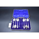 A cased set of six silver teaspoons and matching sugar tongs, by John Sanderson, Sheffield 1912,