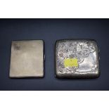 An engine turned silver cigarette case; and one other, 177g. (2)
