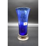 A silver mounted blue glass trumpet vase, by Garrard & Co Ltd, London 1996, 24cm.