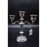 A silver three twin branch candelabrum, by W I Broadway & Co, Birmingham 1976, 23cm high.