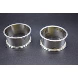 A pair of Victorian silver napkins rings, by Mitchell Bosley & Co, Birmingham 1893, 40g.