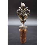 A vintage EPNS novelty pierrot figural bottle stopper, 11cm.