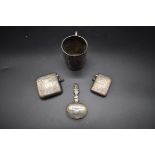 Two silver vesta cases; together with a Victorian silver mug; and a Victorian silver caddy spoon,
