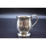 A silver christening mug, by Adie Brothers Ltd, Birmingham 1960, 7.7cm high to rim, 138g.
