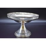 A pierced silver tazza, by Williams Ltd, Birmingham 1925, 14.5cm high x 20.5cm diameter 316g. (s.d).