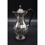 A Victorian silver hot water jug, by William Hutton & Sons Ltd, London 1895, 26cm, 579g all in.