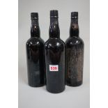 Three bottles of 1940s port, possibly Warre's 1948 vintage, good fill levels. (3)