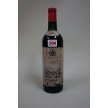 A bottle of Chateau Haut Marbuzet, 1962, (vts).