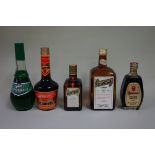 Five various bottles of liqueur, to include: an old 1 litre Gombar Triplice; and a 35cl