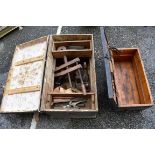 (LC) An old wooden trunk containing tools; together with a small wooden trunk.