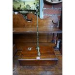 A set of Victorian brass balance scales, 'by W & T Avery', in mahogany box.
