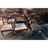 A set of four Regency dining chairs; together with another set of four Regency dining chairs.