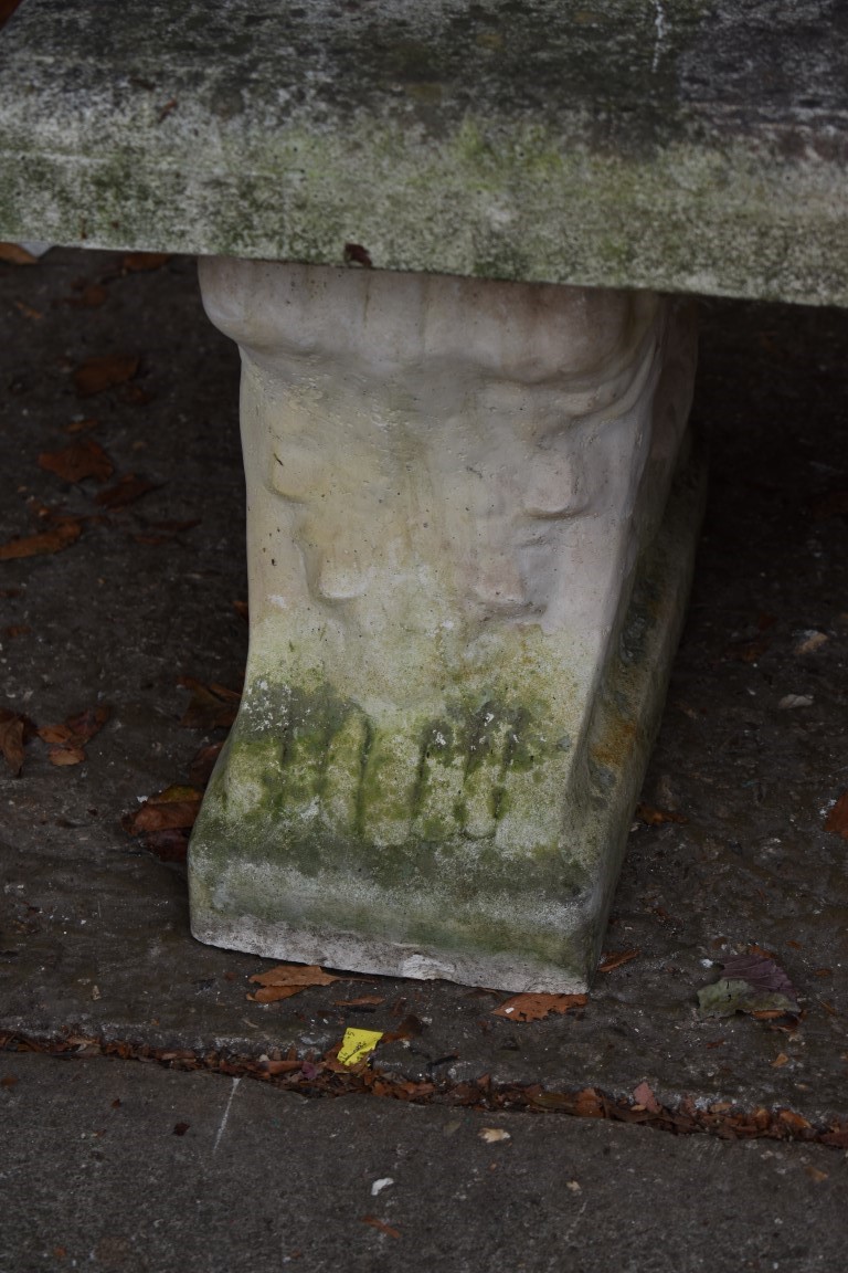 A reconstituted stone garden bench, having a pair of pedestal supports, 141cm wide. - Image 2 of 3