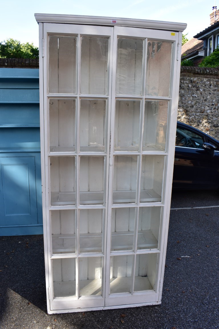 A painted pine display cabinet, 89cm wide x 36cm deep x 203cm high.