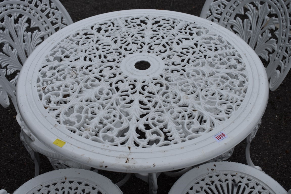 An aluminium white painted garden table; together with four matching chairs. - Image 2 of 3