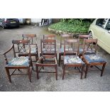 A set of eight antique mahogany dining chairs; to include a pair of carvers.