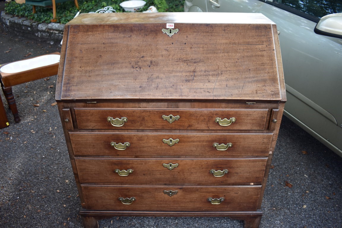 A George III mahogany bureau, 93cm wide x 51cm deep x 104cm high.