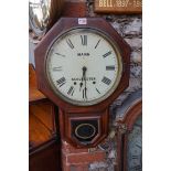 A 19th century American rosewood drop dial wall clock, the 11.5in painted dial inscribed 'Mann,
