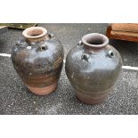 (LC) A pair of decorative garden urns, 60cm high.
