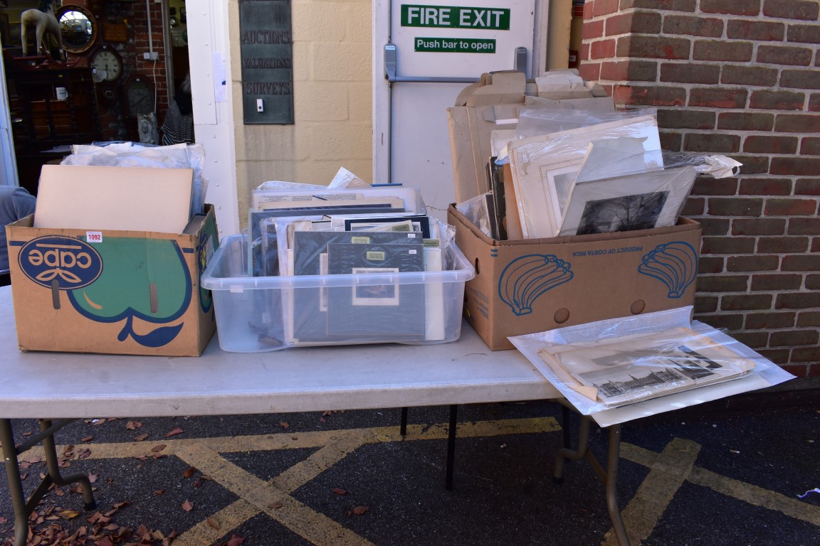 Three boxes of various prints and etchings.