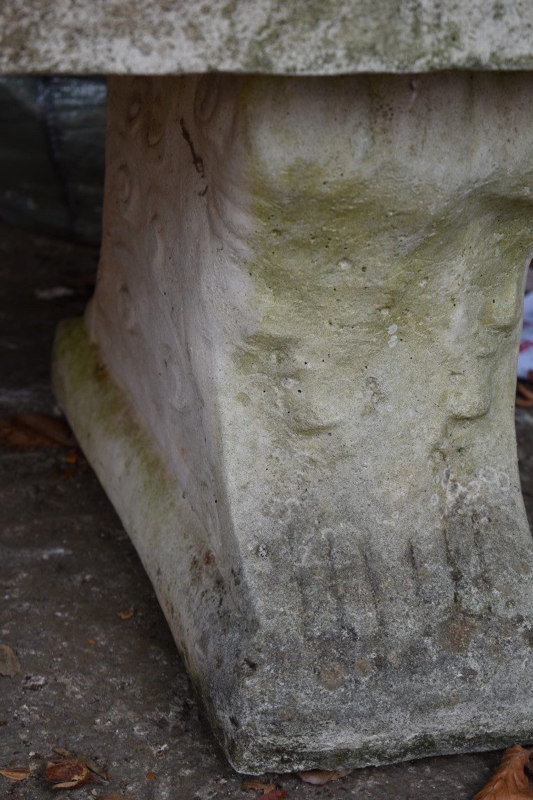 A reconstituted stone garden bench, having a pair of pedestal supports, 141cm wide. - Image 3 of 3