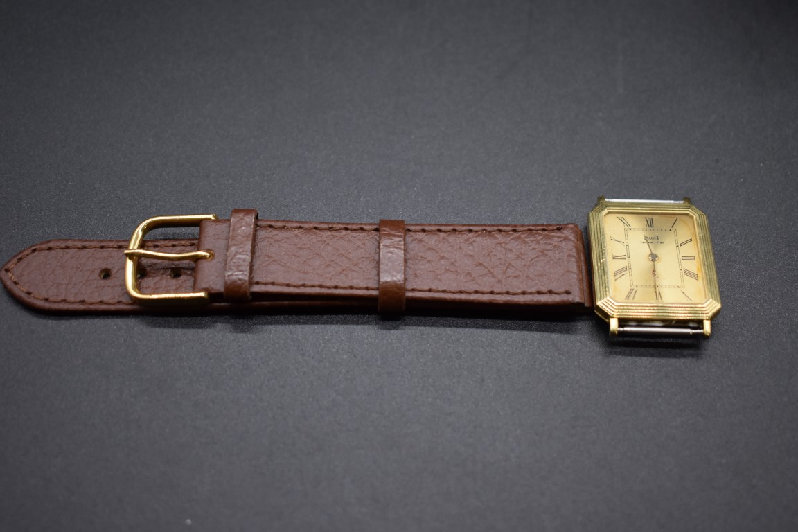 A Piaget 18ct gold quartz wristwatch, Ref 7142, case No. 347275, 28 x 24mm, with a replacement