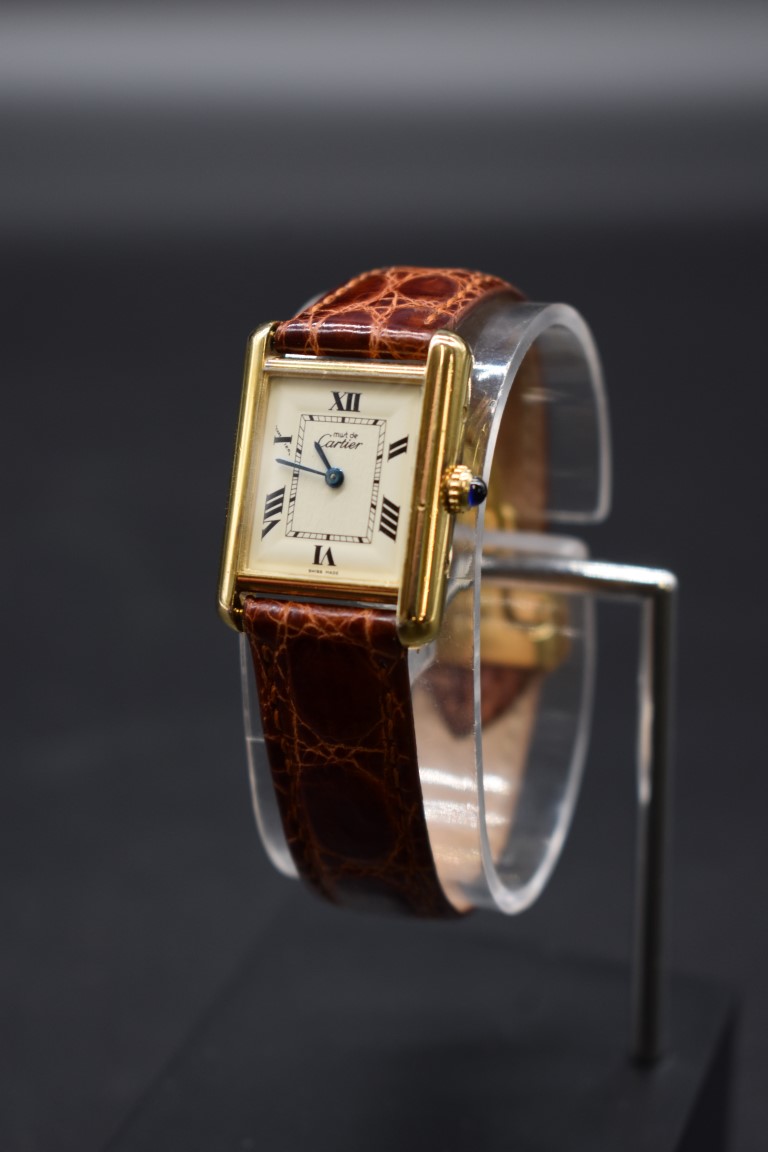 A vintage Cartier 'Must De Cartier' Vermeille 18k gold on sterling silver quartz tank wristwatch,