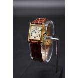 A vintage Cartier 'Must De Cartier' Vermeille 18k gold on sterling silver quartz tank wristwatch,